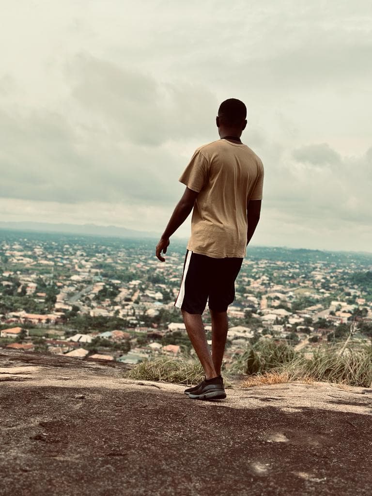 Charles Nwankwo on a hill